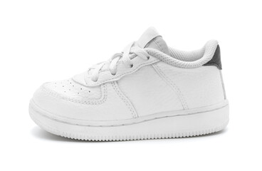 New unbranded fashion stylish white sport walking kid shoes or sneakers isolated on white background.