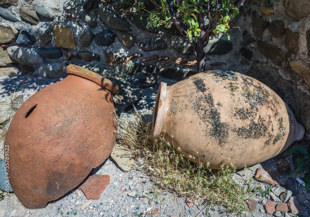 Sticker Kvevri earthenware vessels for wine in Uplistsikhe ancient rock-hewn town, Georgia