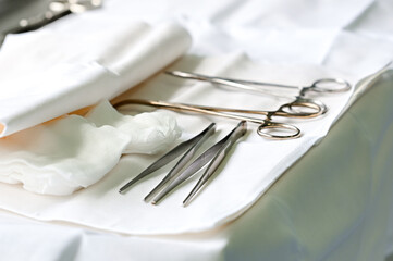 Medical sterile instruments lie on the table