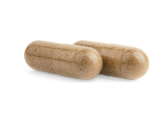 Vitamin capsules isolated on white. Health supplements