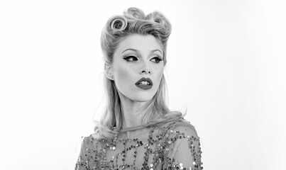 High Fashion model woman posing in studio. Young smiling woman dressed in pin-up style.