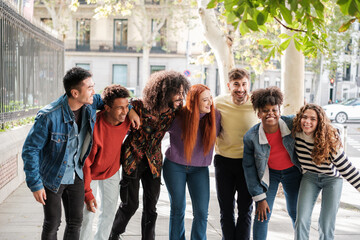 Group of young friends outdoors sharing good times. Concept. lifestyle, together, fun