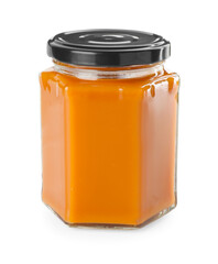 Delicious persimmon jam in jar isolated on white