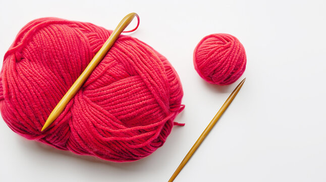 Wolle in pink mit Stricknadel, copy space