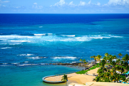 Tropical seascape aerial landscape in San Juan, Puerto Rico over La Poza del Escambr&oacute;n Beach and Escambron Beach