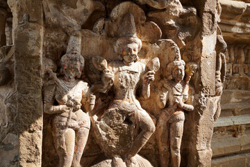 Hindu God and Animal sandstone sculptures in ancient hindu temple walls. Historical statues of...