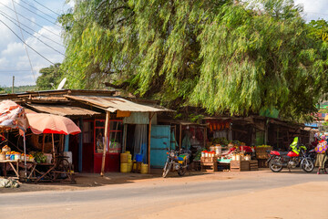 Roadside shops and stalls in Kenyan village - 755847121