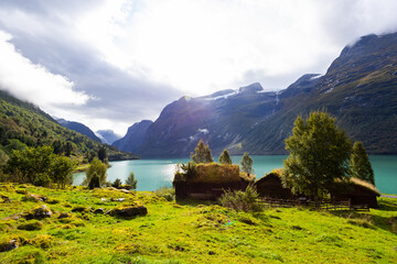Traditional houses in Lovatnet lake valley in south Norway, Europe