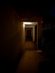 Dimly lit motel alleyway