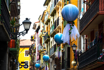 Local festival celebration in Tolosa, Spain. Creative street decoration with fitness balls. 