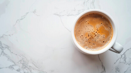 a cup of cappuccino with foam on marble background.