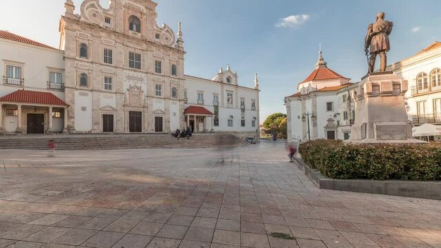 Panorama showing Sa da Bandeira Square with a view of the Santarem See Cathedral aka Nossa Senhora da Conceicao Church timelapse, built in the 17th century Mannerist style. Walking area. Portugal