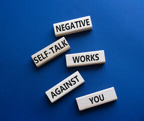 Negative self-talk works against you symbol. Concept words Negative self-talk works against you on...