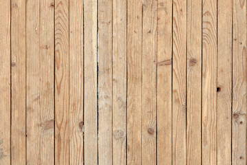 Fototapeta premium A wooden background with a few small holes in it