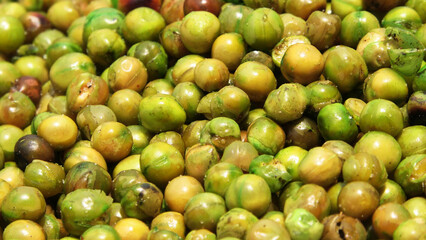 Roasted nuts ready for sale in a street shop