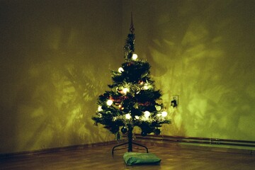 Christmas tree in Chomutov in Czechia  on 24. December 2023 on colour film photo -  blurriness and...