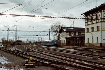 Train station in Jan Palach Vsetaty  in Czechia on 16. January 2024 on 55th anniversary of his self-immolation on colour film photo -  blurriness and noise of scanned 35mm film were intentionally left