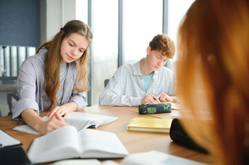 group of young college students in classroom