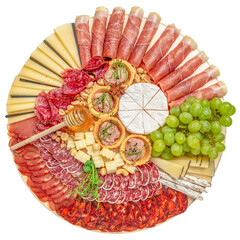 Antipasto platter cold meat plate with grissini bread sticks, prosciutto, slices ham, grapes, jamon ham, beef jerky, chorizo salami, fuet, pate and honey