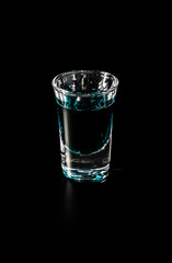 Shot glass with blue drink