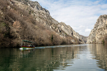 View of beautiful tourist attraction, lake at Matka Canyon in the Skopje surroundings. Macedonia. - 755909905