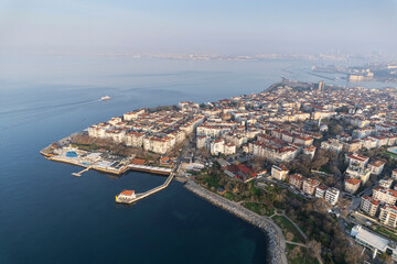 Historical Moda Pier. Moda neighbourhood of Kadikoy, Istanbul, Turkey. Beautiful aerial view. Drone shot. - 755916961