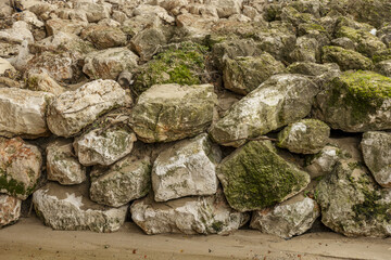 An artificial wall of rocks in the bed