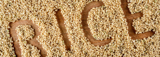Nutritious Brown Rice: 4K Ultra HD Image of Brown Rice on Wooden Board