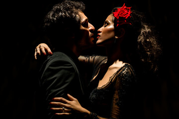 Intimate Embrace in Low Light - A Romantic Scene Between Two Lovers. Tango or Flamenco