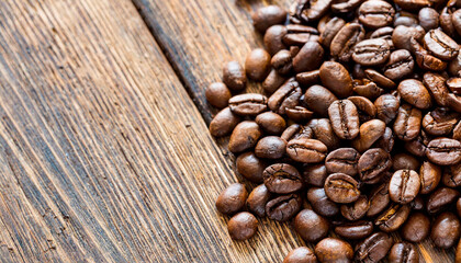 Café mania. Top view of a traditional coffee beans on a rustic wooden table and various beans...