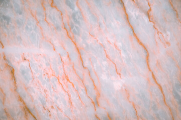 Fototapeta premium Detailed extreme closeup surface of decorative white orange marble