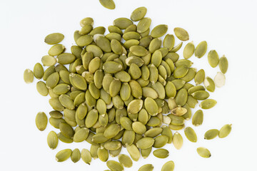 Nutritious nut pumpkin seeds on white background