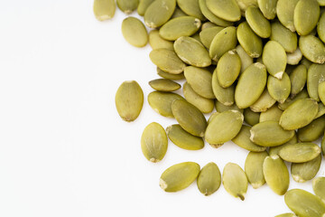 Nutritious nut pumpkin seeds on white background
