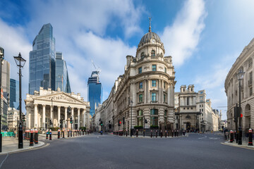 Panoramic long exposure view of the City of London with the historic, financial buildings in front of the modern office skyscrapers
