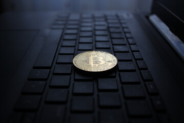 a bitcoin on the keyboard