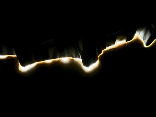 A ribbon of light across a dark surface