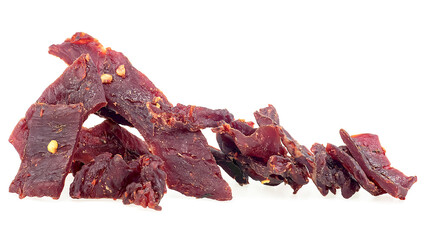 Pile of spicy beef jerky isolated on a white background. Pieces of dry meat. - 755948722
