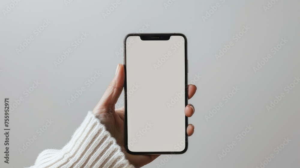 Aufkleber a person holding up a smart phone with a blank screen. ideal for technology concepts.