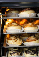 Cinnabons and other rolls are baking in the oven