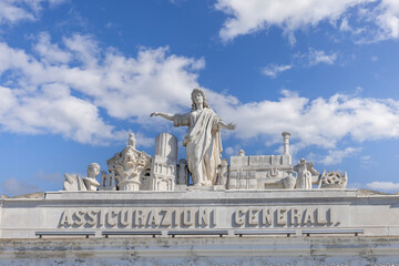Sculptures on top of the 19th century Stratto Palace located on Unity of Italy Square, Trieste,...