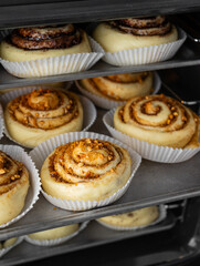 Cinnabons and other rolls are baking in the oven