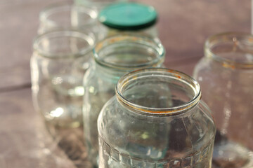 Empty washed glass jars in sunlight.