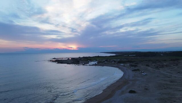 The scenic views of sea and the waves during sunset hours at the beach of Side, Antalya