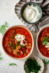Cabbage rolls soup in a ceramic bowl on a table.  .style hugge