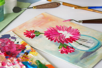 acrylic painting of flowers with paintbrush, palette knife and palette