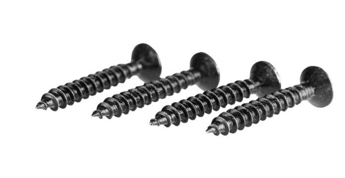 black wood screws on isolated white background close up
