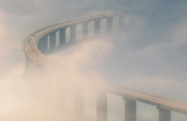foggy bridge over the river