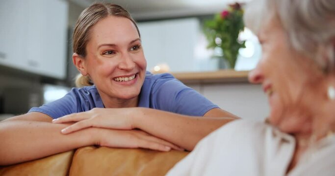 Medical, smile and nurse chatting to old woman on sofa in living room of home for consulting or help. Healthcare, happy and friendly caregiver talking to senior patient in retirement apartment