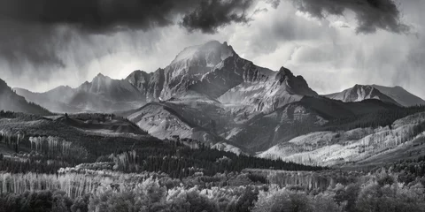 Fotobehang A stunning black and white photo of a majestic mountain range. Perfect for nature and landscape themed projects. © Fotograf