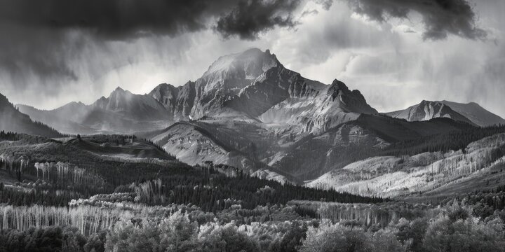 A stunning black and white photo of a majestic mountain range. Perfect for nature and landscape themed projects.
